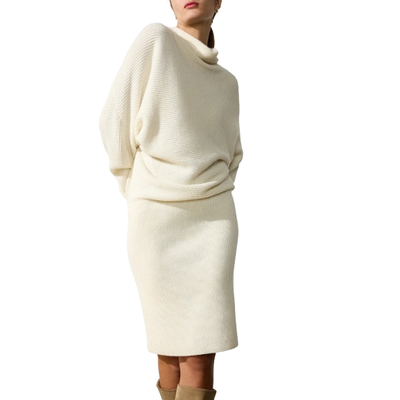 MODEL WEARING BROCHU WALKER THE CLEDE SWEATER DRESS IN IVORY