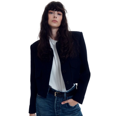 MODEL WEARING CITIZENS OF HUMANITY CORINA CROPPED JACKET IN NAVY