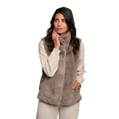MODEL WEARING RINO & PELLE LISON VEST IN TAUPE