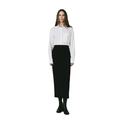 MODEL WEARING RUE SOPHIE RAOULET BACK ZIP PENCIL SKIRT IN BLACK