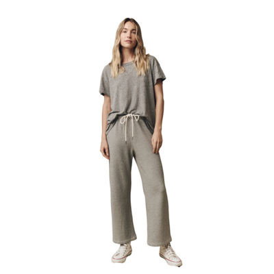 MODEL WEARING THE GREAT THE LAP SWEATPANT IN VARSITY GREY