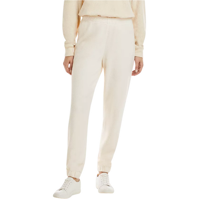Model wearing teddy fleece sweats in off white